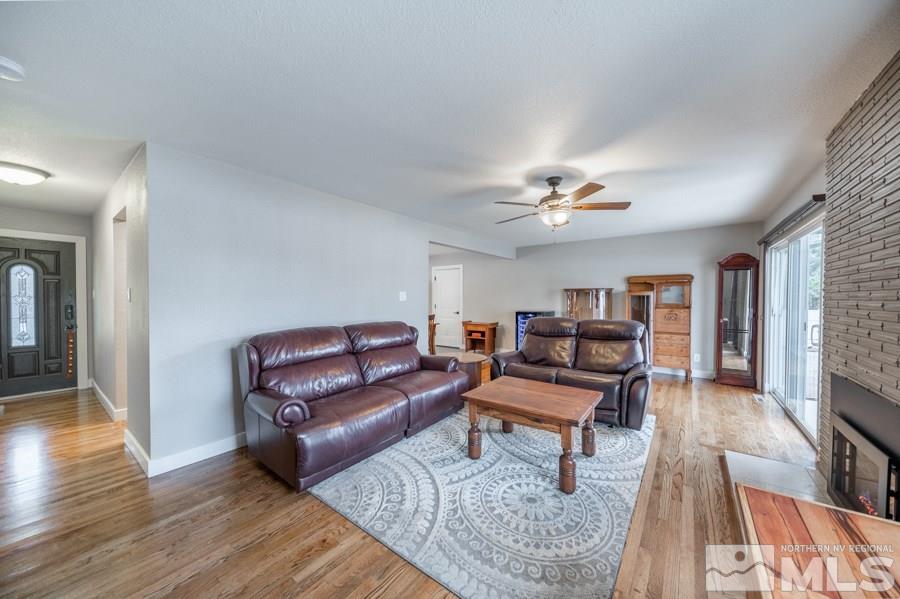 1640 Davidson Way Reno, NV 89509 - Photo 3 of 25 a living room with furniture and wooden floor