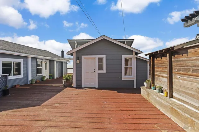 a view of balcony with furniture
