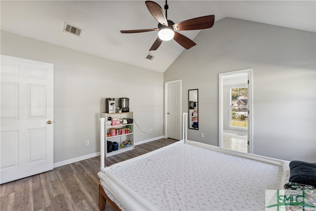 8 Stoney Hill Road Pooler, GA 31322 - Photo 23 of 47 Primary bedroom with open door leading into bathro