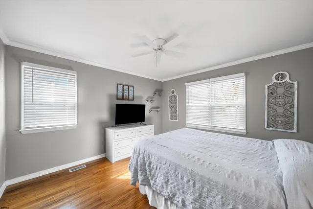 a bathroom with a sink toilet and mirror
