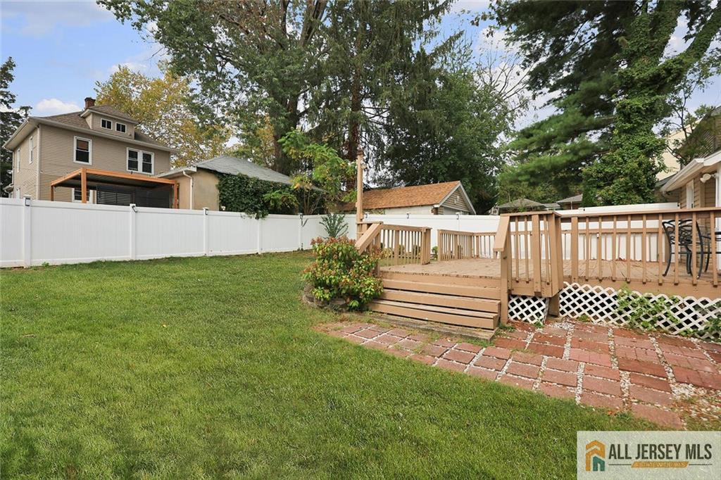23 Edgegrove Street Edison, NJ 08837 - Photo 27 of 34 a view of a house with a yard