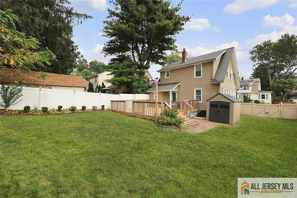 23 Edgegrove Street Edison, NJ 08837 - Photo 28 of 34 a view of a house with backyard and garden