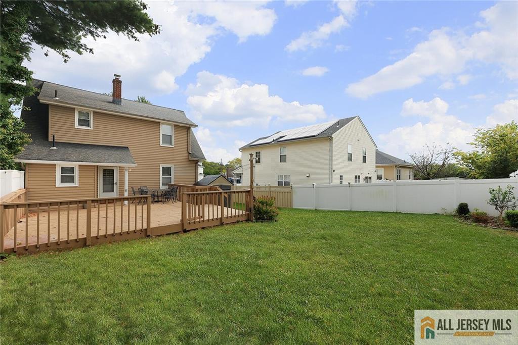 23 Edgegrove Street Edison, NJ 08837 - Photo 30 of 34 a view of a house with a yard and sitting area