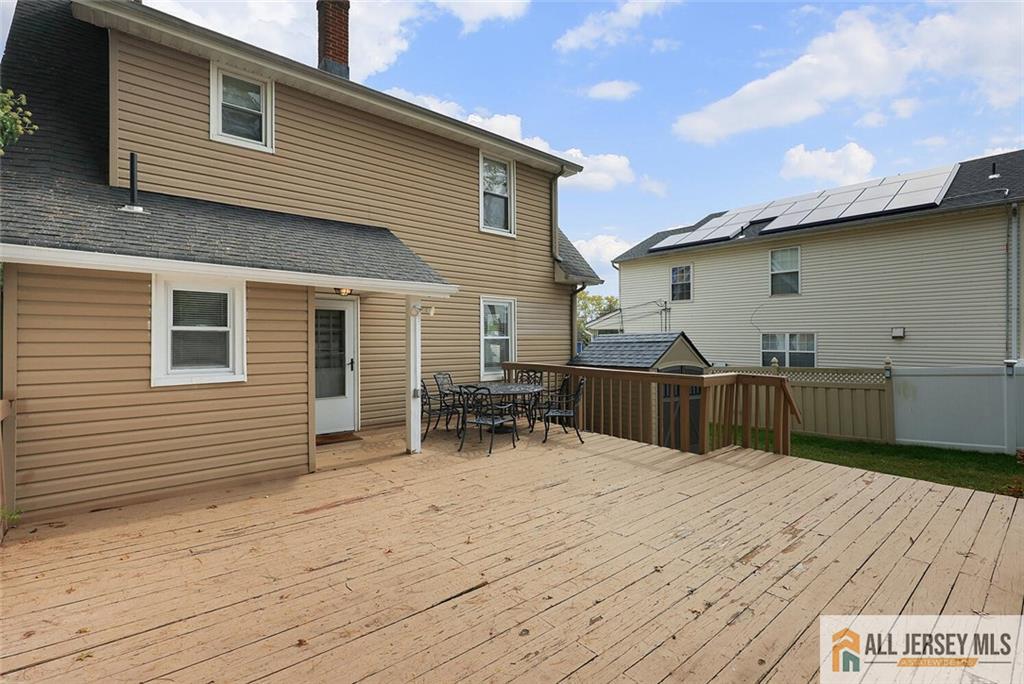 23 Edgegrove Street Edison, NJ 08837 - Photo 31 of 34 a view of house with deck and outdoor seating