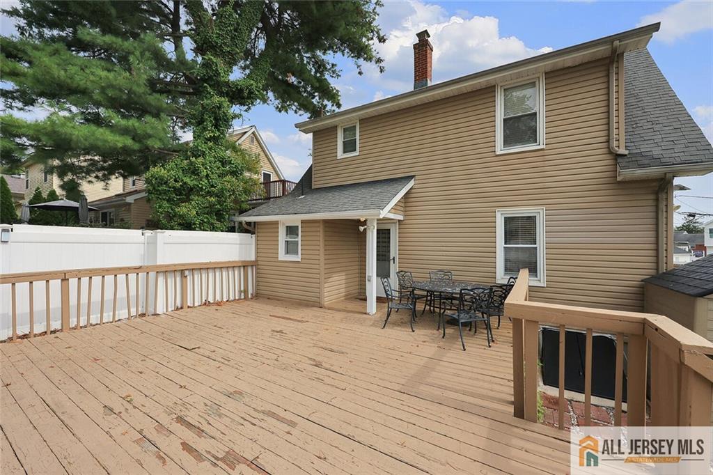 23 Edgegrove Street Edison, NJ 08837 - Photo 32 of 34 a view of a house with a deck