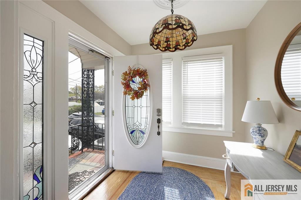 23 Edgegrove Street Edison, NJ 08837 - Photo 5 of 34 a view of a livingroom with a window and furniture