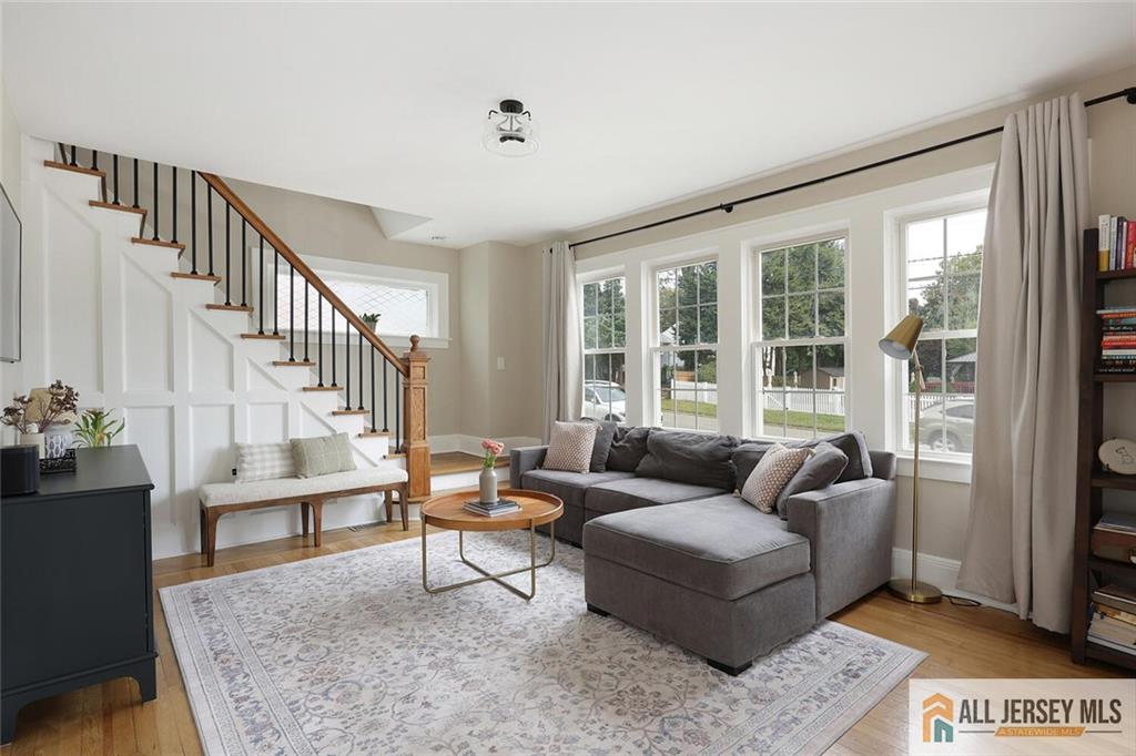 23 Edgegrove Street Edison, NJ 08837 - Photo 6 of 34 a living room with furniture and a table
