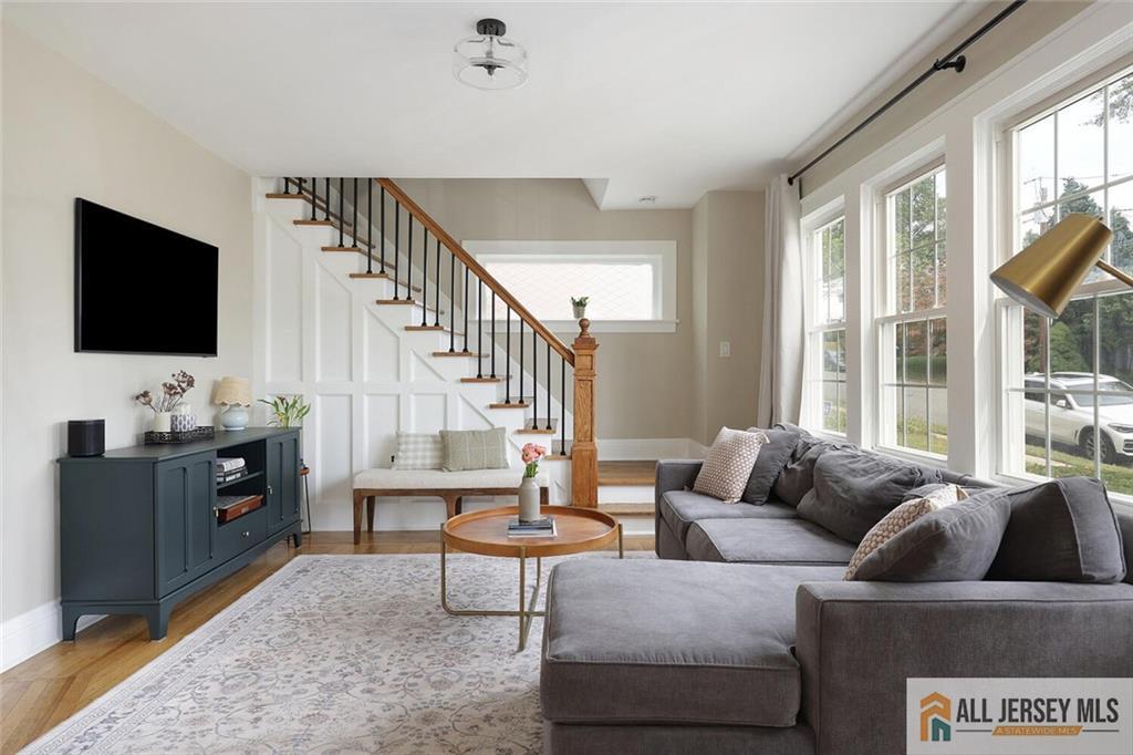 23 Edgegrove Street Edison, NJ 08837 - Photo 7 of 34 a living room with furniture and a flat screen tv