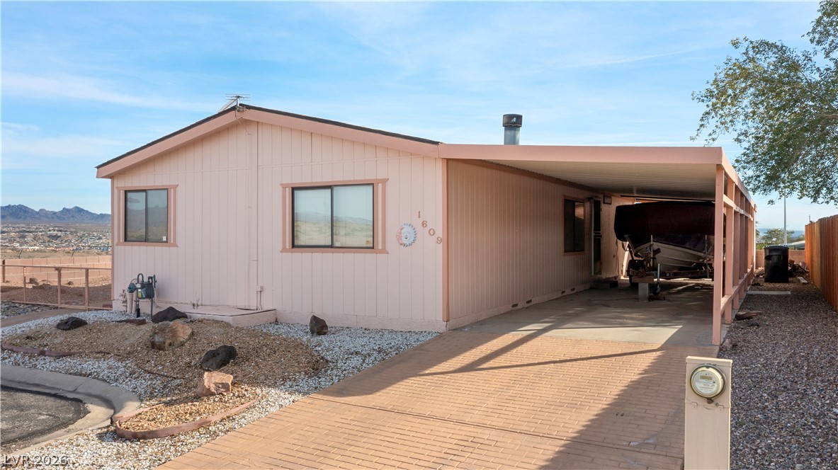 1609 Cajon Court Laughlin, NV 89029 - Photo 56 of 69 View of front of property featuring a carport and decorative driveway