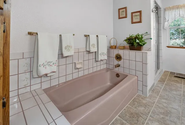 a view of a hallway with wooden shelves