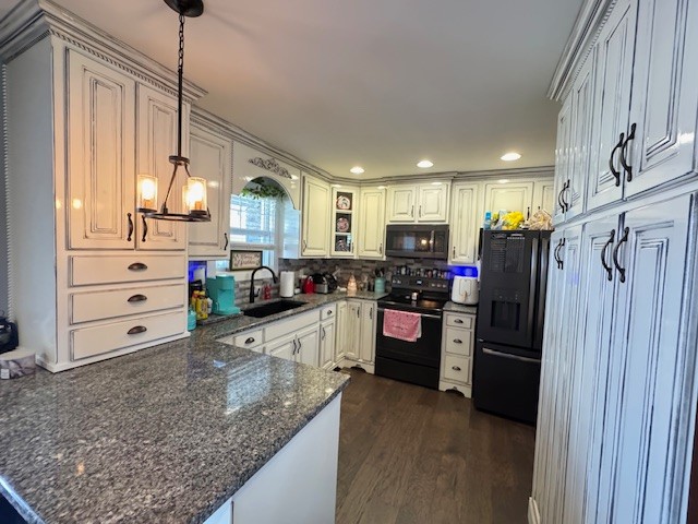 46 Knights Church Road Decherd, TN 37324 - Photo 5 of 26 a kitchen with refrigerator and cabinets