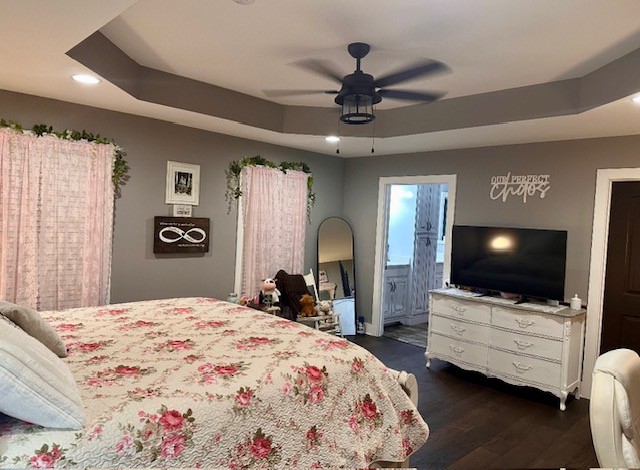 46 Knights Church Road Decherd, TN 37324 - Photo 8 of 26 a bedroom with a bed and a flat tv screen on dresser