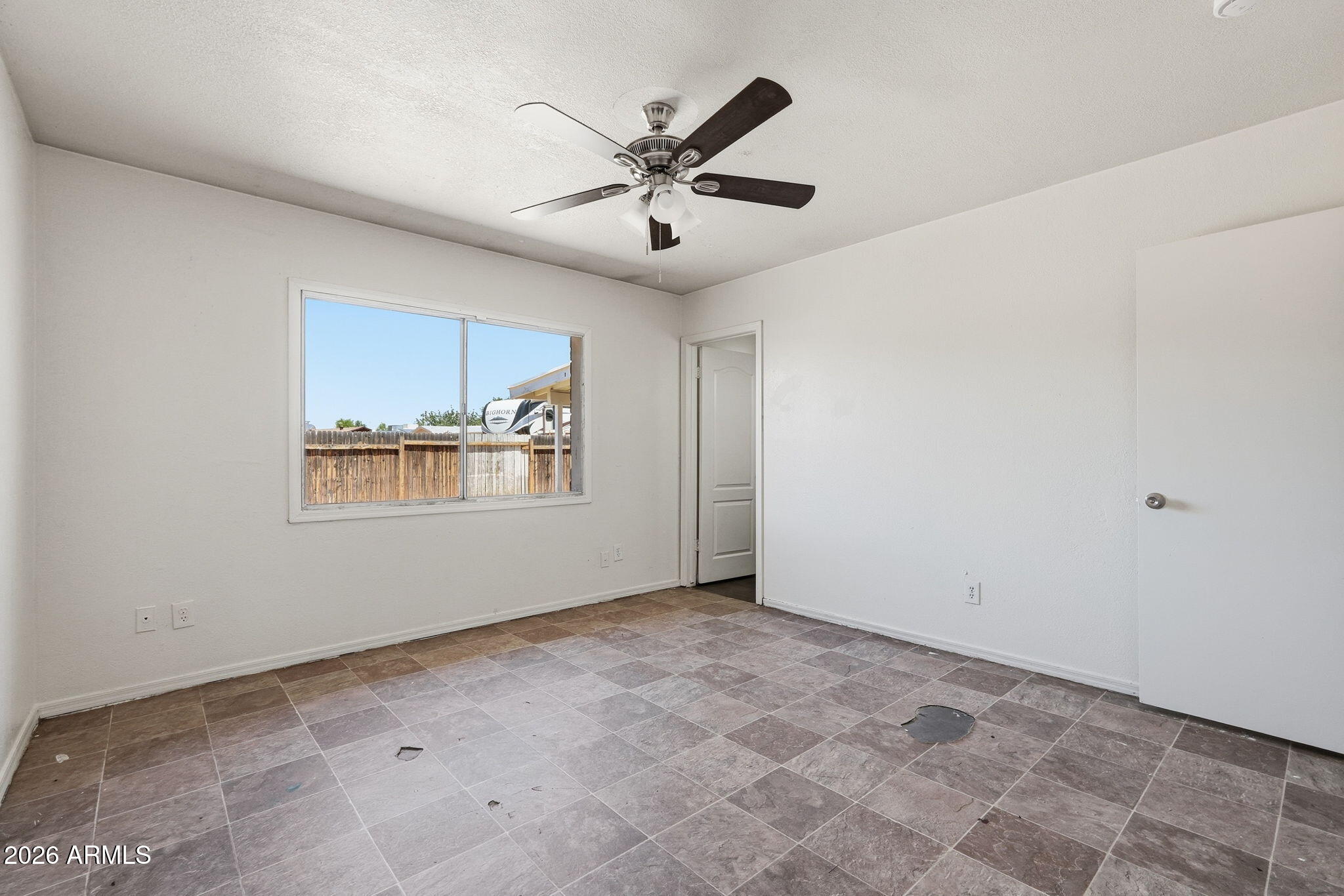 6452 West Thomas Road Phoenix, AZ 85033 - Photo 15 of 30 a view of an empty room with a window