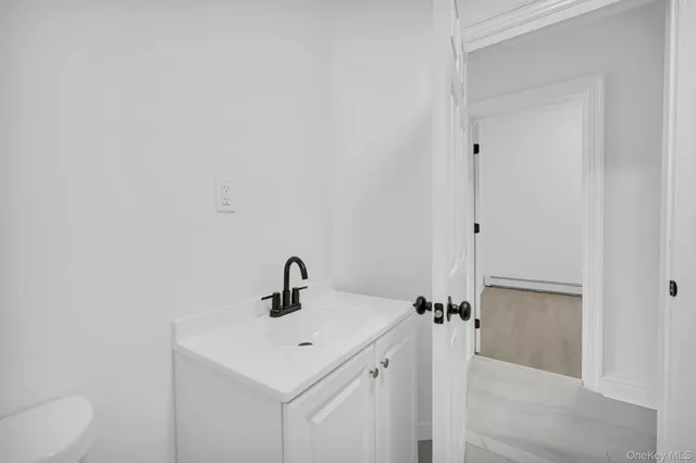 a view of a hallway with staircase