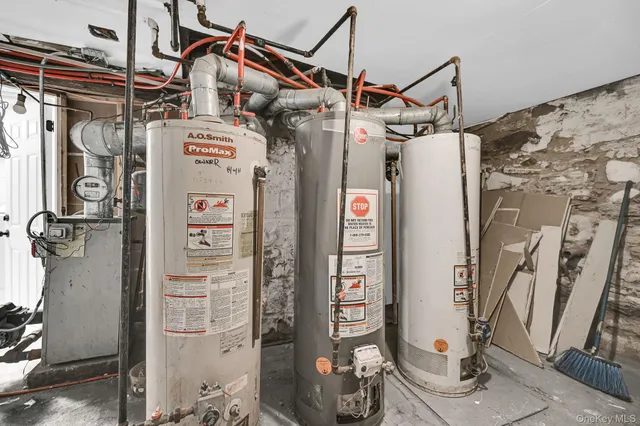 a view of a garden with wooden fence