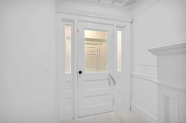 a view of a room that has a window in it