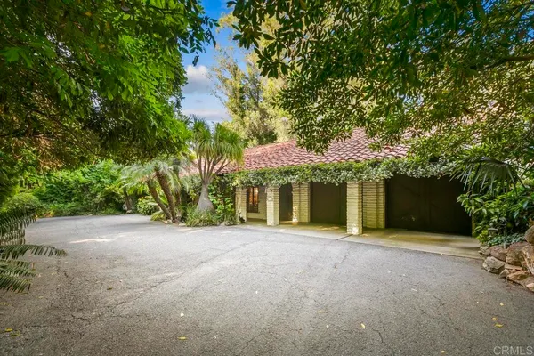 a view of outdoor space with wooden bridge