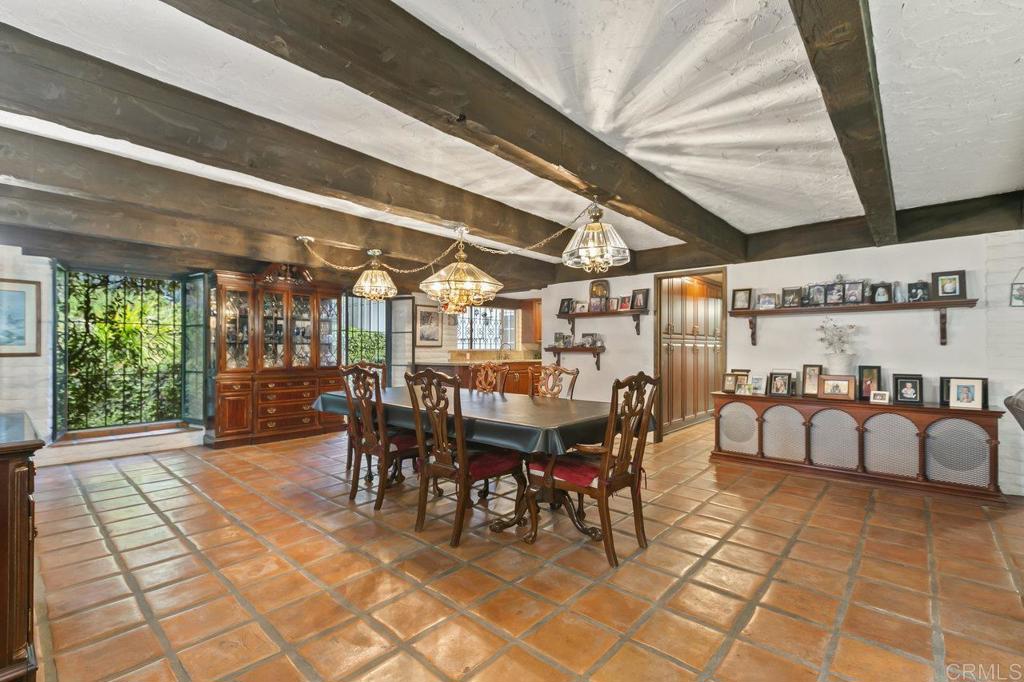 6036 Rainbow Heights Road Fallbrook, CA 92028 - Photo 31 of 70 a view of a patio with table and chairs with wooden floor and fence