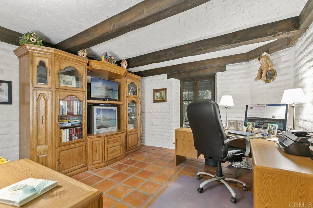 6036 Rainbow Heights Road Fallbrook, CA 92028 - Photo 37 of 70 a view of a workspace with furniture and a window
