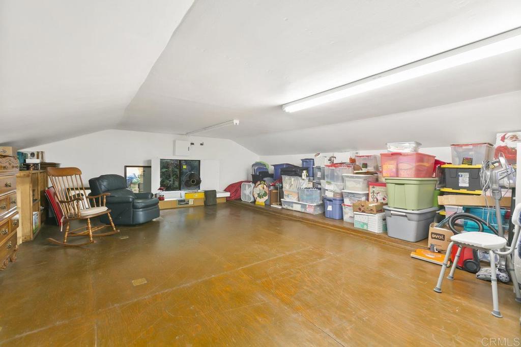 6036 Rainbow Heights Road Fallbrook, CA 92028 - Photo 40 of 70 a living room with lots of furniture and a flat screen tv