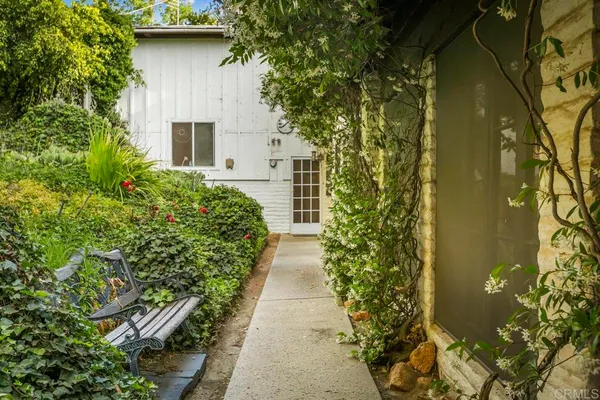 a view of a house with a street