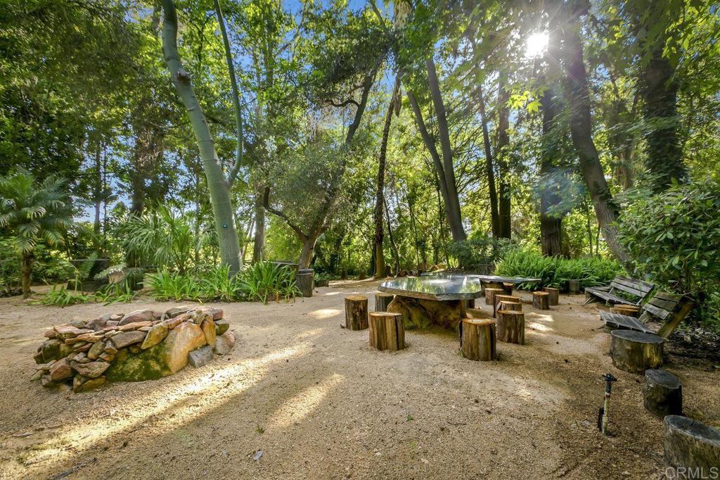 6036 Rainbow Heights Road Fallbrook, CA 92028 - Photo 55 of 70 a view of a backyard with sitting area