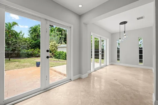 an empty room with windows