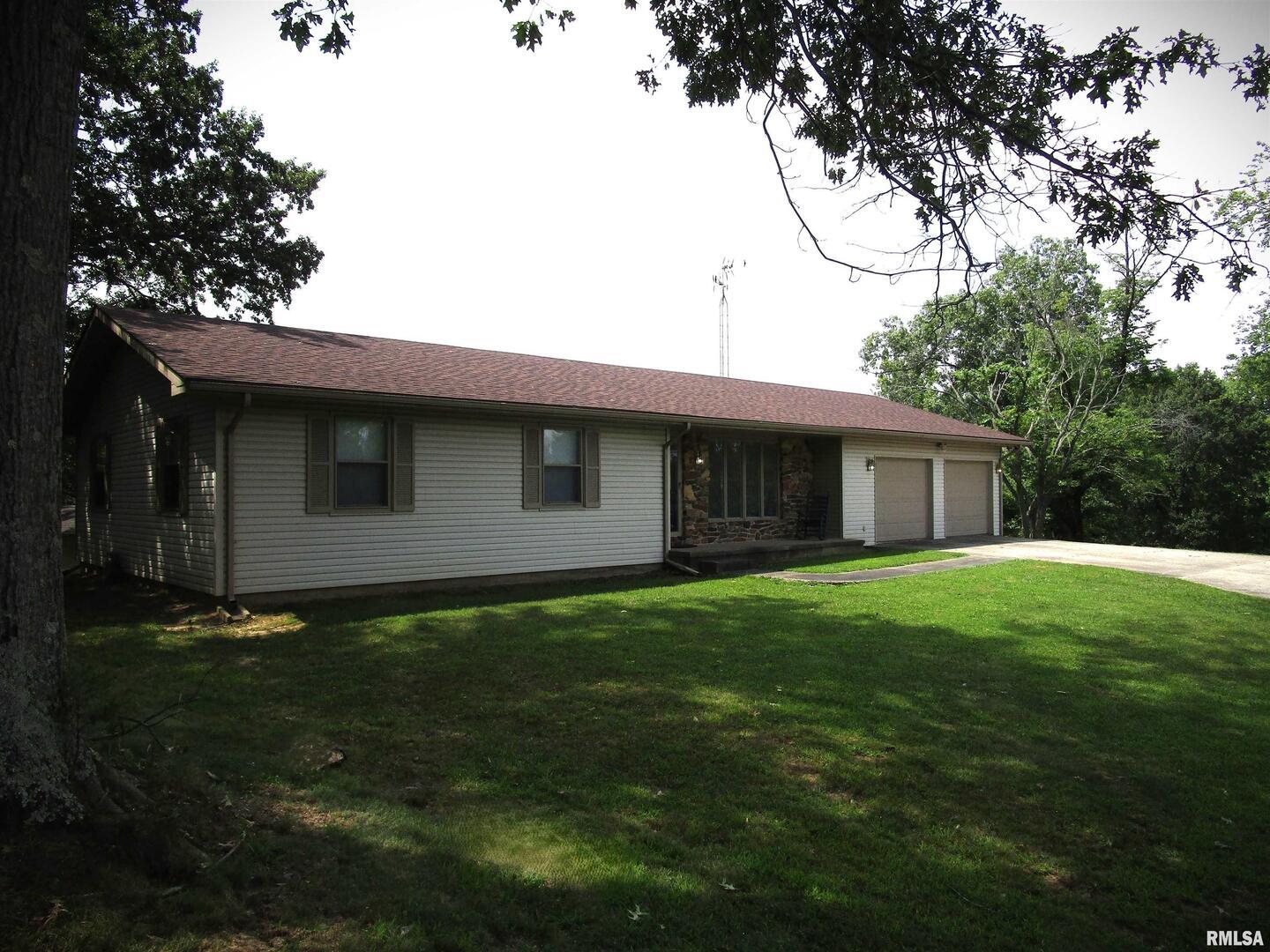 1253 County Road 800 East Carmi, IL 62821 - Photo 50 of 51 a front view of house with yard and green space