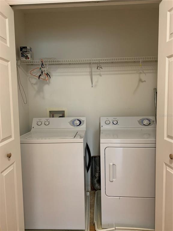 1531 Water Terrace Lane Brandon, FL 33511 - Photo 12 of 14 a utility room with dryer and washer