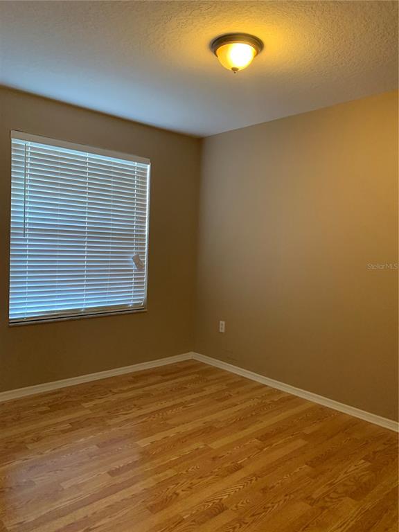 1531 Water Terrace Lane Brandon, FL 33511 - Photo 8 of 14 an empty room with a empty space and a window