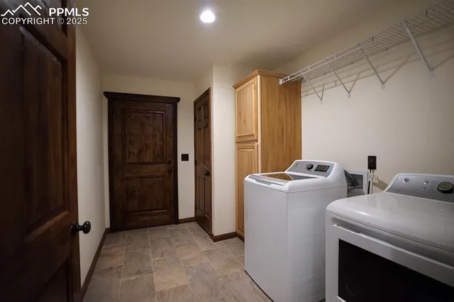 a utility room with dryer and washer