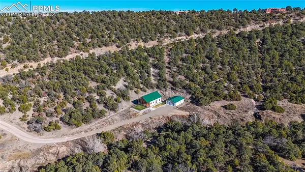 a view of a plant with a park