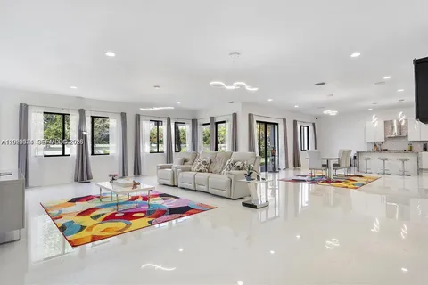 a room with furniture and rug floor