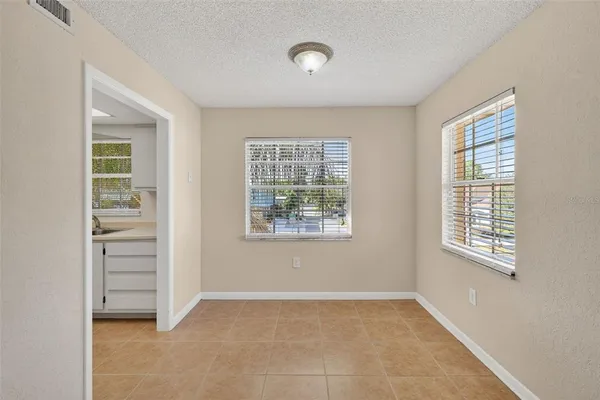 a kitchen that has a sink and a window