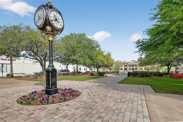 a view of street with stores
