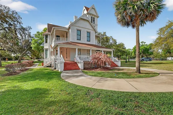 a view of street with parked cars