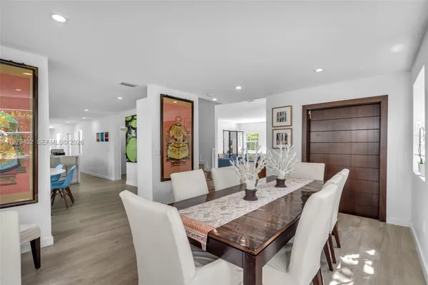 a view of a dining room with furniture