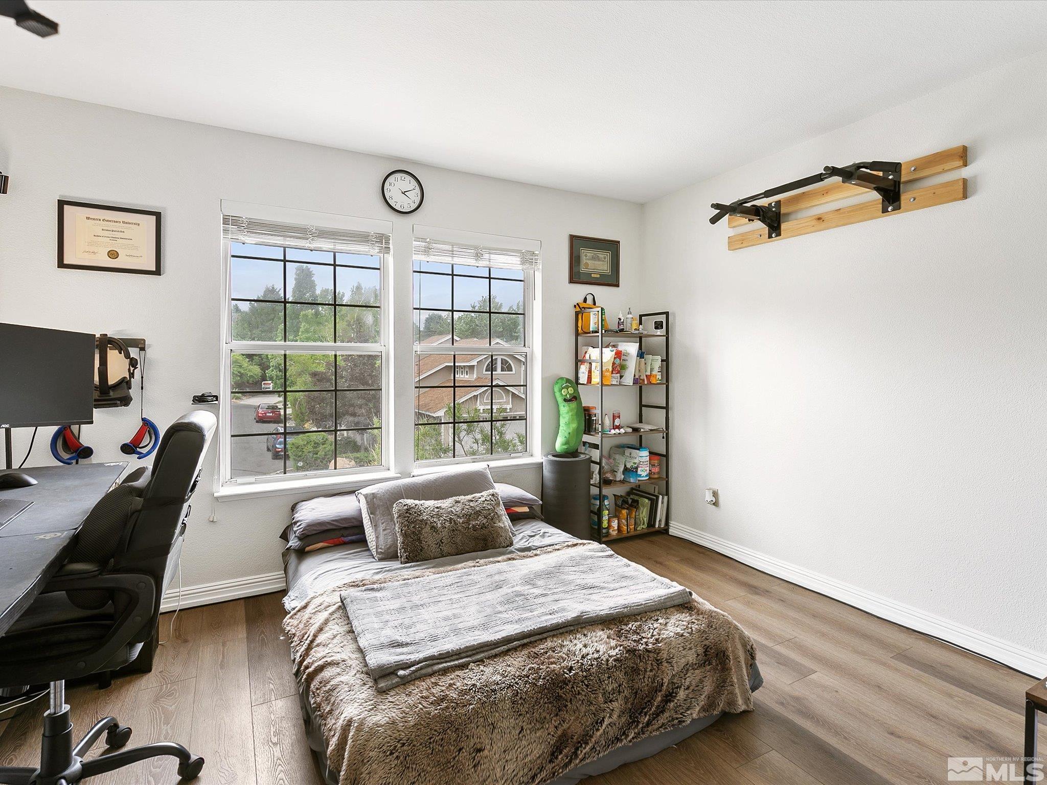2860 Alpine Creek Road Reno, NV 89519 - Photo 23 of 39 a bedroom with a bed and a window