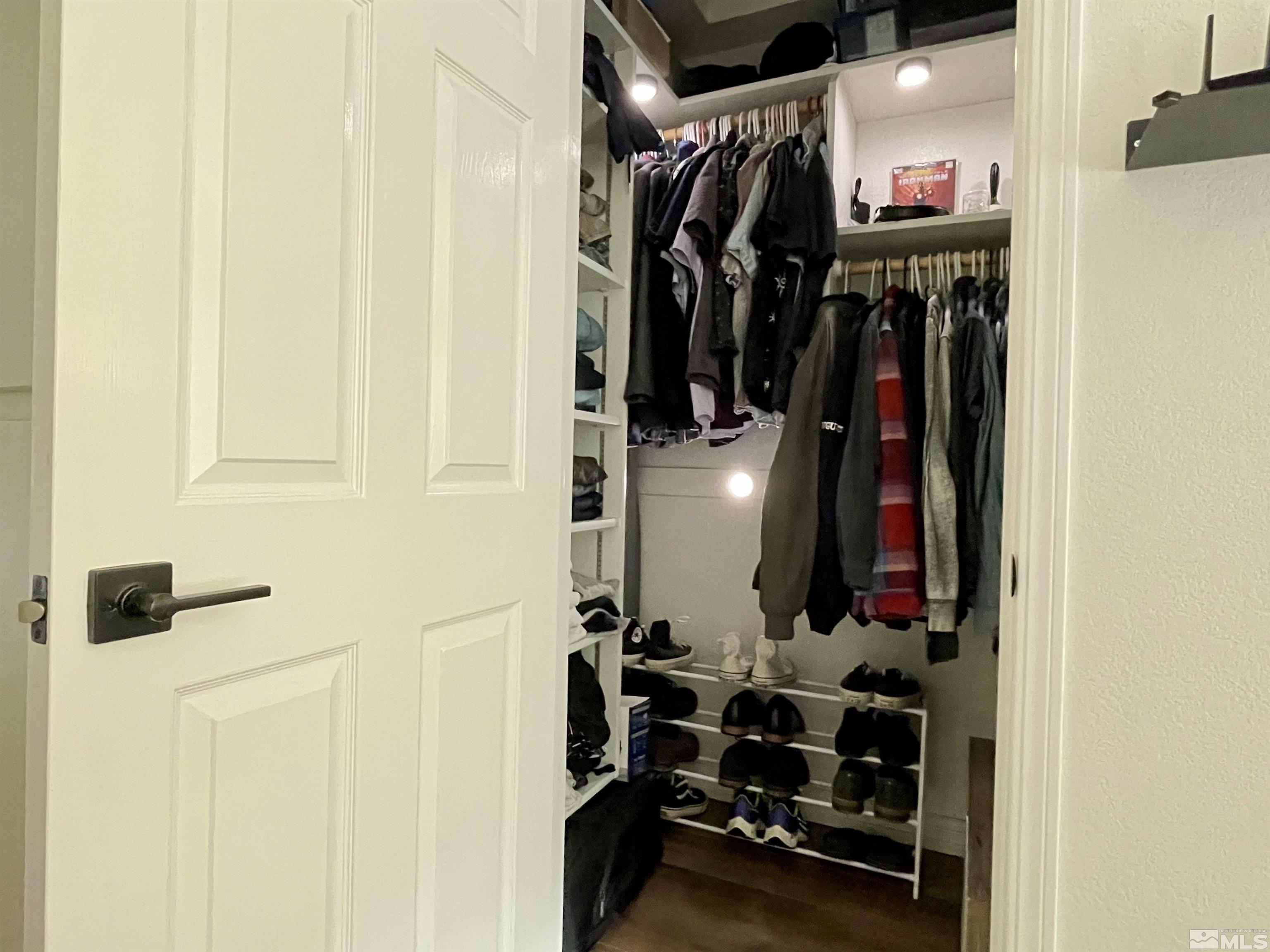 2860 Alpine Creek Road Reno, NV 89519 - Photo 24 of 39 a view of walk in closet with clothes and shoes