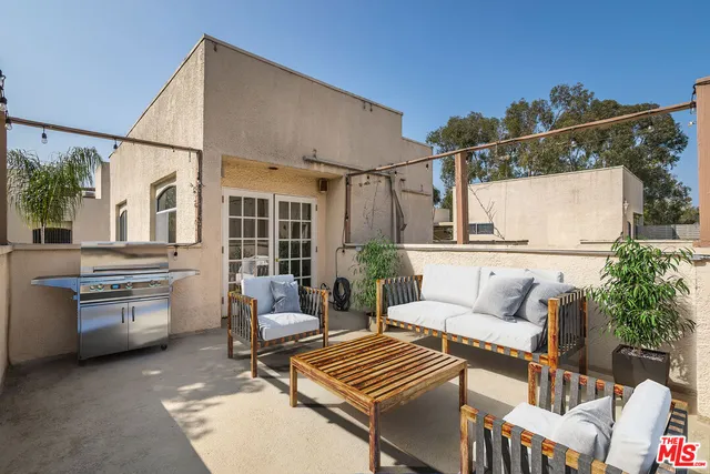 $1,295,000 | 410 South Barrington Avenue, Unit 309, Los Angeles, CA 90049