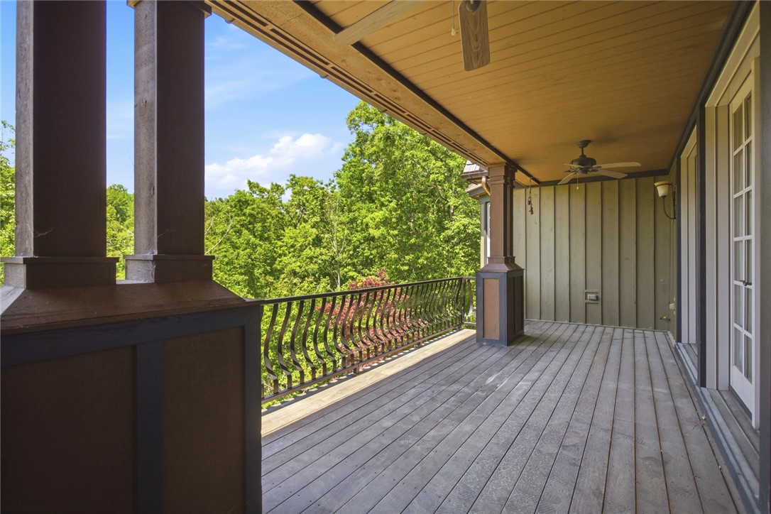 130 River Ridge Road Sunset, SC 29685 - Photo 23 of 47 This spacious balcony offers treetop views, perfect for peaceful outdoor enjoyment.