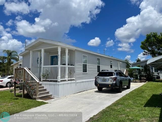 Park City Davie, FL 33324 - Photo 2 of 22 a view of a house with a back yard