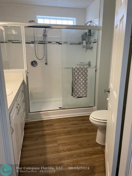 Park City Davie, FL 33324 - Photo 21 of 22 a bathroom with a granite countertop shower toilet and a shower