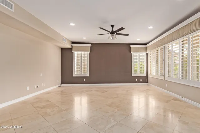 a view of an empty room with kitchen appliances