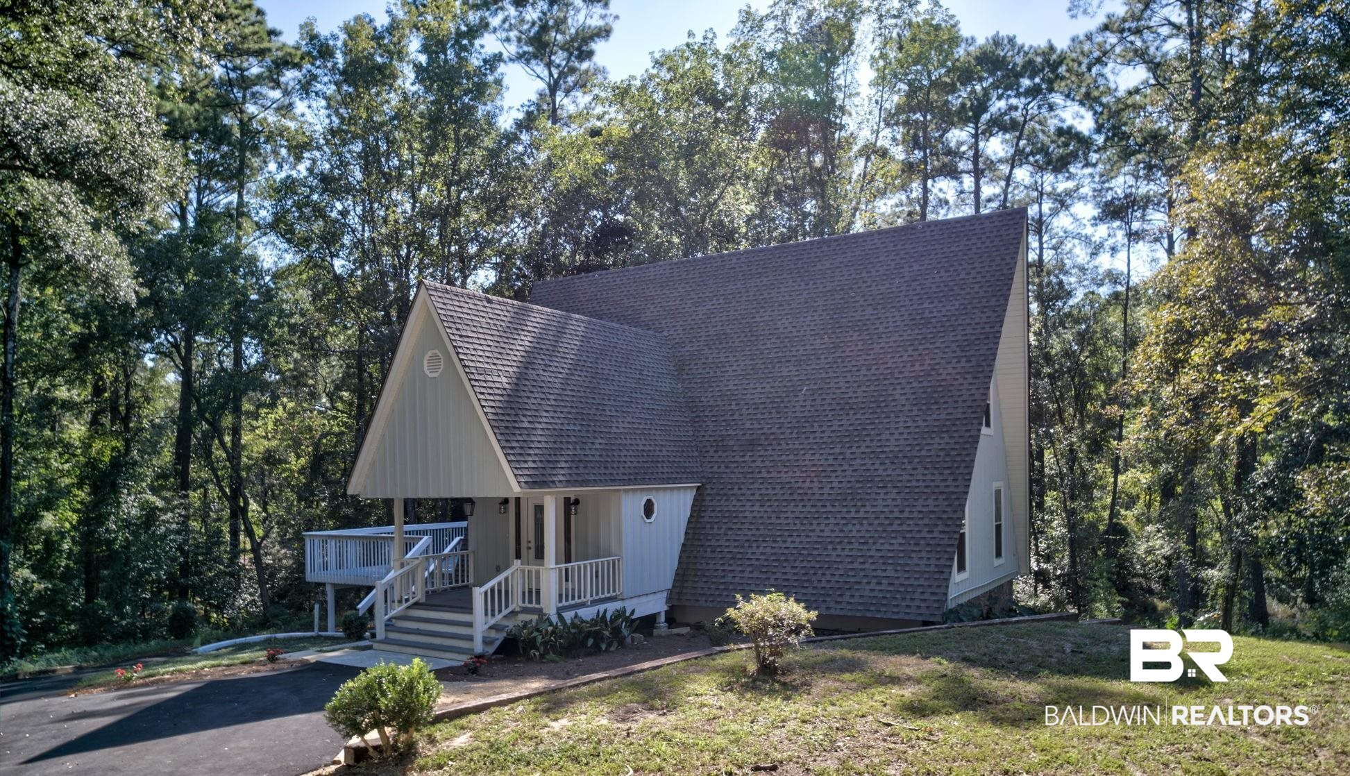 7130 Lake Minette Point Daphne, AL 36527 - Photo 2 of 51 View of front of home with a front yard and covered porch