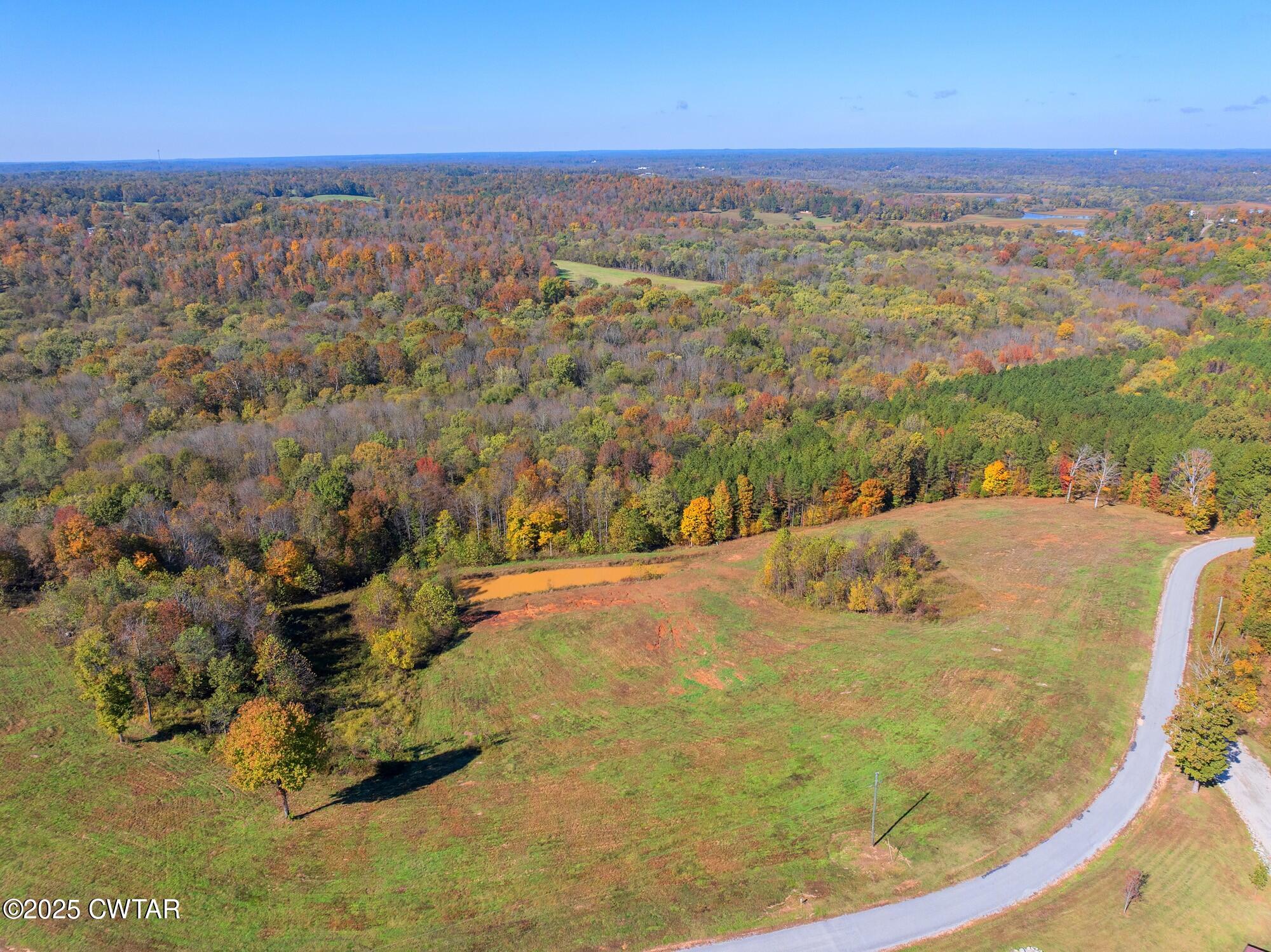 0 Dr Fisher Lane Decaturville, TN 38329 - Photo 13 of 25 a view of a lake