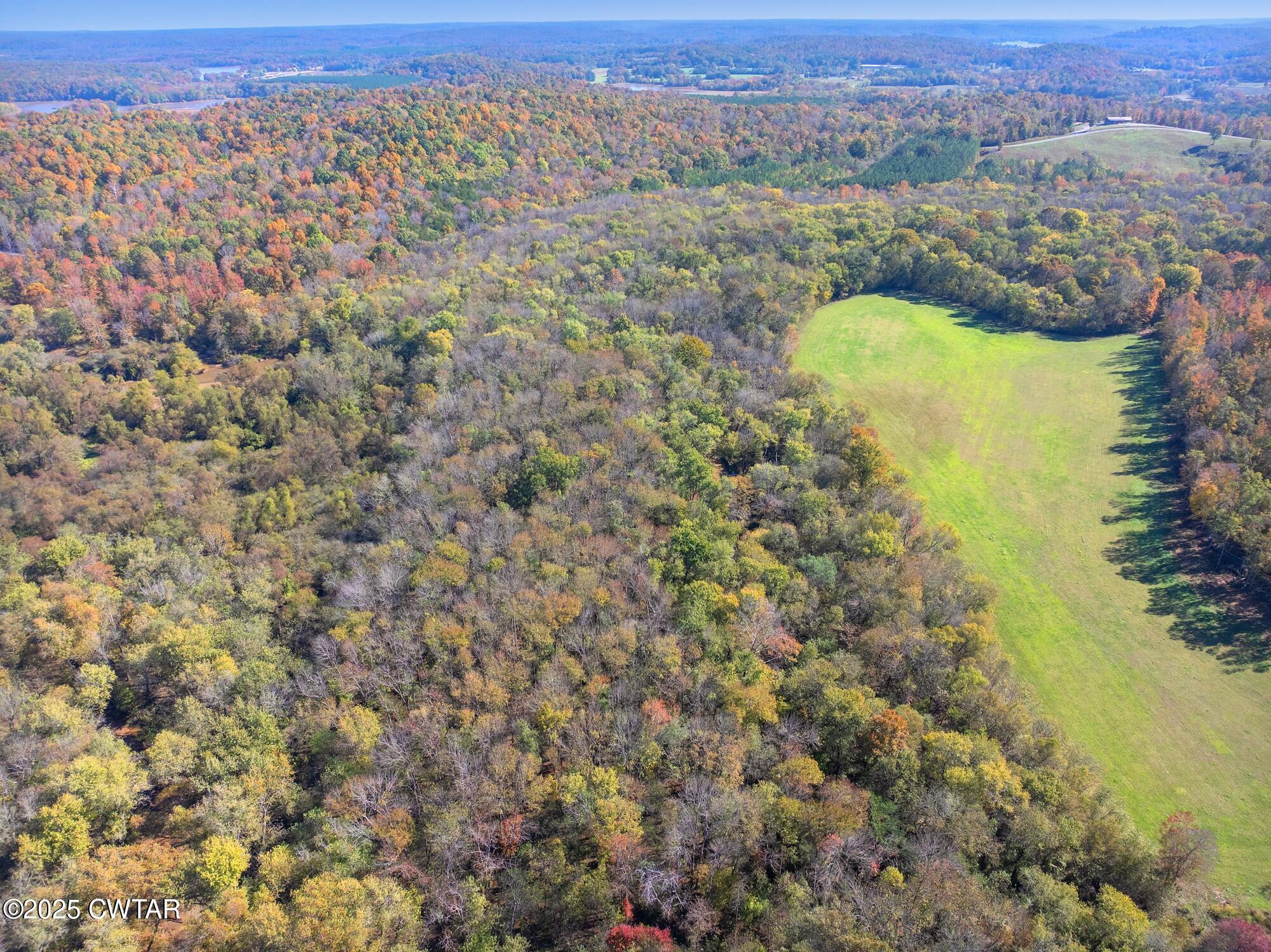 0 Dr Fisher Lane Decaturville, TN 38329 - Photo 6 of 25 a view of a city with mountains in the background