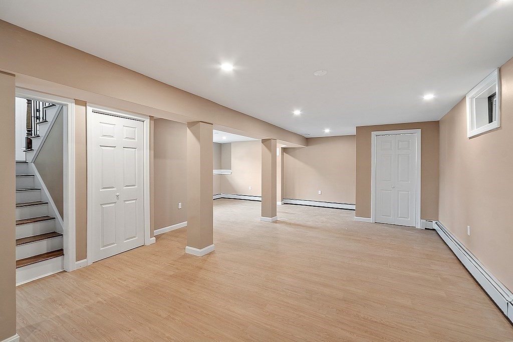 621 Boston Road Billerica, MA 01821 - Photo 18 of 27 a view of empty room with wooden floor and entryway