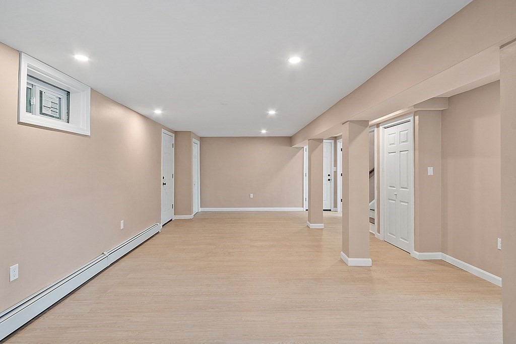 621 Boston Road Billerica, MA 01821 - Photo 19 of 27 a view of an empty room with a window