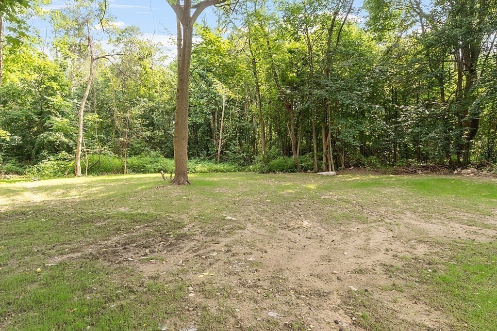 621 Boston Road Billerica, MA 01821 - Photo 27 of 27 a view of a field with trees in the background